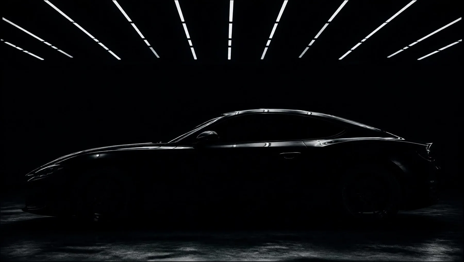 Sports car under studio strip lights